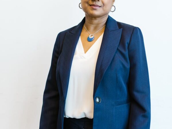 woman in blue blazer and white inner shirt